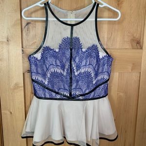 Lace, leather, mesh, peplum top